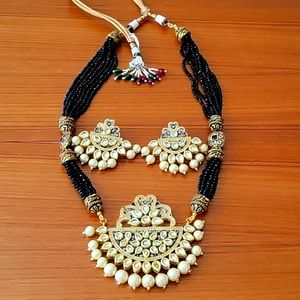 Pearl, Kundan and Crystal necklace and earrings set. Embroidered and well made.